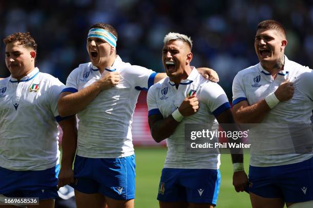 The players of Italy sing a rendition of the Italian national anthem prior to the Rugby World Cup France 2023 match between Italy and Namibia at...