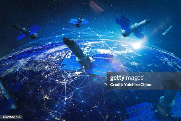 satellite internet communication to the earth - satellite dish stockfoto's en -beelden