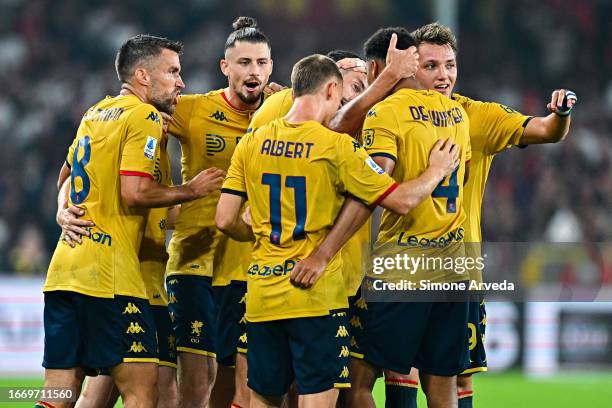 Mattia Bani of Genoa celebrates with his team-mates after scoring a goal during the Serie A TIM match between Genoa CFC and SSC Napoli at Stadio...