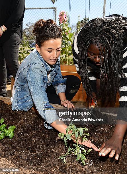 Actress Emmanuelle Chriqui celebrates Earth Day with the Environmental Media Association at Cochran Middle School on April 18, 2013 in Los Angeles,...