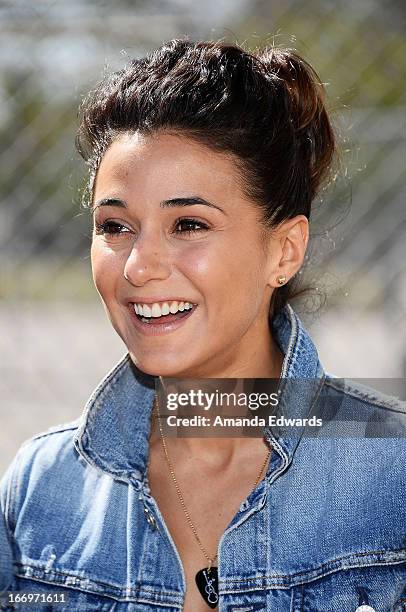 Actress Emmanuelle Chriqui celebrates Earth Day with the Environmental Media Association at Cochran Middle School on April 18, 2013 in Los Angeles,...