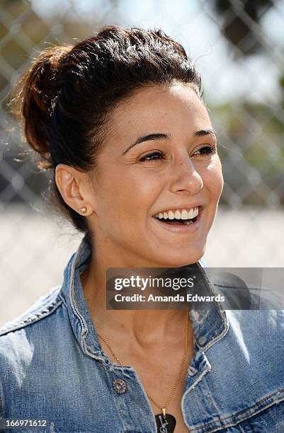 Actress Emmanuelle Chriqui celebrates Earth Day with the Environmental Media Association at Cochran Middle School on April 18, 2013 in Los Angeles,...