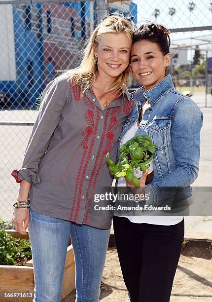 Actresses Amy Smart and Emmanuelle Chriqui celebrate Earth Day with the Environmental Media Association at Cochran Middle School on April 18, 2013 in...