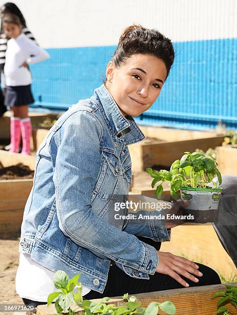 Actress Emmanuelle Chriqui celebrates Earth Day with the Environmental Media Association at Cochran Middle School on April 18, 2013 in Los Angeles,...