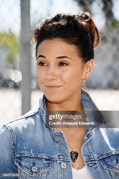 Actress Emmanuelle Chriqui celebrates Earth Day with the Environmental Media Association at Cochran Middle School on April 18, 2013 in Los Angeles,...