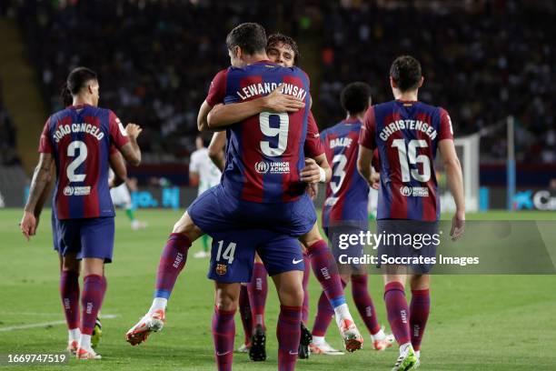 Robert Lewandowski of FC Barcelona celebrates 2-0 with Joao Felix of FC Barcelona during the LaLiga EA Sports match between FC Barcelona v Real Betis...