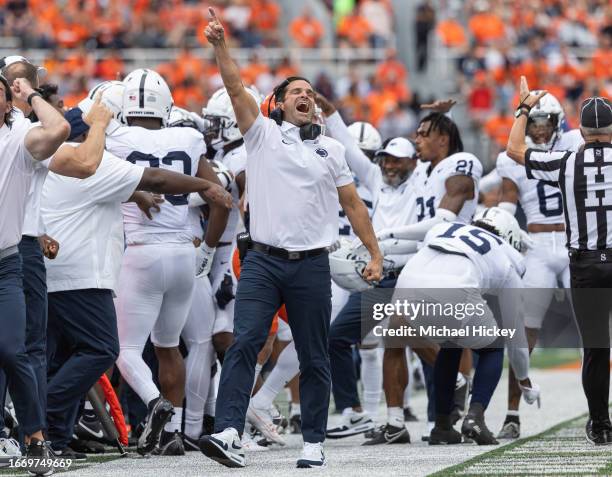 Defensive coordinator Manny Diaz of the Penn State Nittany Lions celebrates after an interception during the second half against the Illinois...