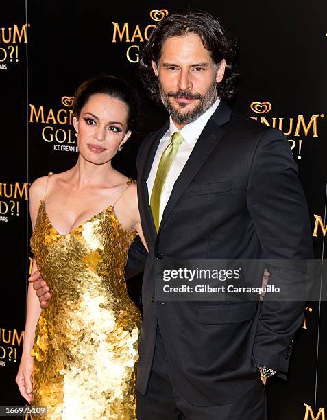 Actress Caroline Correa wearing a Zac Posen one-of-a-kind 24k gold dress valued at $1.5 million and actor Joe Manganiello attend the premiere of "As...
