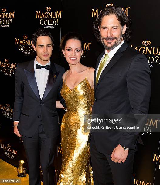 Designer Zac Posen, actress Caroline Correa wearing a Zac Posen one-of-a-kind 24k gold dress valued at $1.5 million and actor Joe Manganiello attend...
