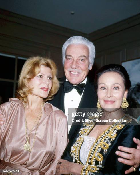 American actress Rita Hayworth with Cesar Romero , circa 1980.