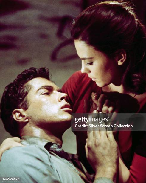 American actors Richard Beymer, as Tony, and Natalie Wood as Maria, in 'West Side Story', directed by Robert Wise and Jerome Robbins, 1961.