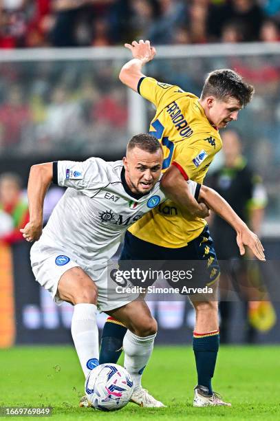 Stanislav Lobotka of Napoli and Morten Frendrup of Genoa vie for the ball during the Serie A TIM match between Genoa CFC and SSC Napoli at Stadio...