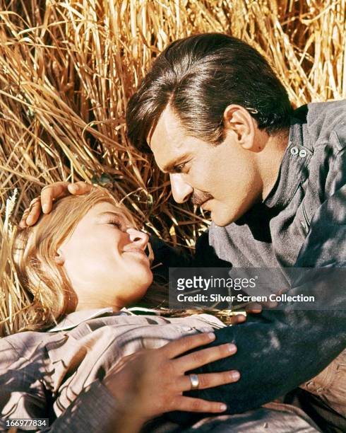 Omar Sharif, as Yuri, and Julie Christie as Lara, in a publicity still for 'Doctor Zhivago', directed by David Lean, 1965.