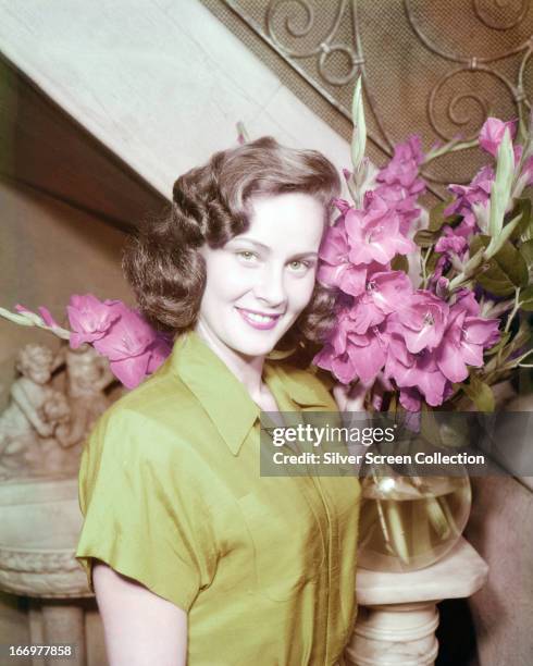 Italian actress Alida Valli with a bowl of flowers, circa 1945.