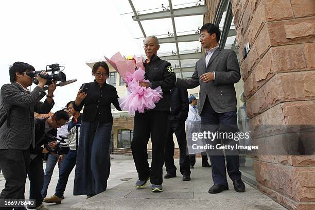 Man, who was infected with H7N9 bird flu, is discharged from Shanghai Public Health Clinical Center on April 18, 2013 in Shanghai, China. China on...