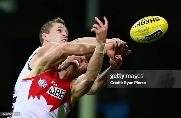 Joel Selwood of the Cats spoils Ryan O'Keefe of the Swans during the round four AFL match between the Sydney Swans and the Geelong Cats at the SCG on...