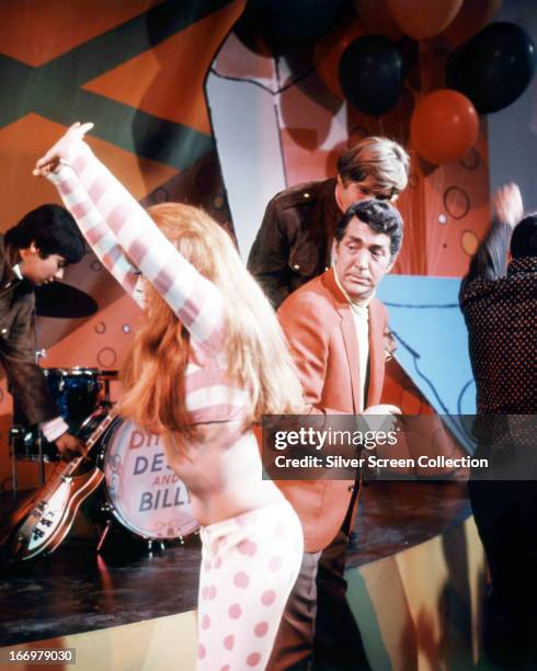 Dean Martin , as Matt Helm and Ann-Margret as Suzie, dancing in a scene from 'Murderers' Row', directed by Henry Levin, 1966.