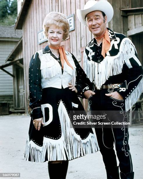 Married American actors Dale Evans and Roy Rogers in western outfits, circa 1965.
