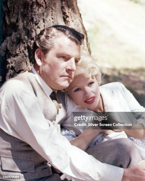 English actor Kenneth More as Jonathan Tibbs, and American actress Jayne Mansfield as Kate, in 'The Sheriff of Fractured Jaw', directed by Raoul...