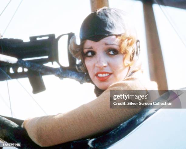 American actress Liza Minnelli in the cockpit of a biplane in a publicity still for 'Lucky Lady', directed by Stanley Donen, 1975.