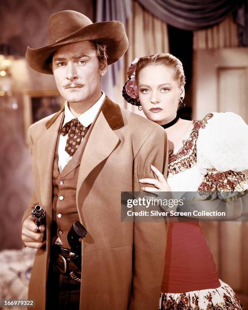 Errol Flynn as Clay Hardin, and Alexis Smith as Jeanne Starr in 'San Antonio', directed by David Butler, 1945.
