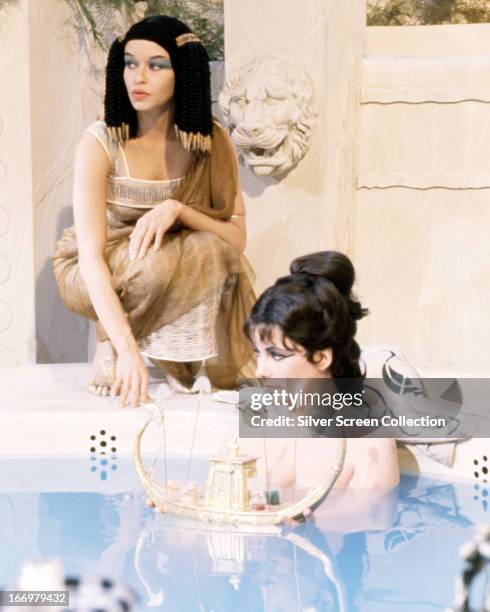 British-born actress Elizabeth Taylor in a bath scene from 'Cleopatra', directed by Joseph L. Mankiewicz, 1963.