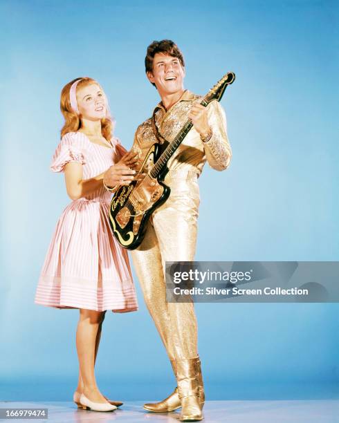 Swedish-American actress Ann-Margret and American actor Jesse Pearson in a promotional portrait for 'Bye Bye Birdie', directed by George Sidney, 1963.
