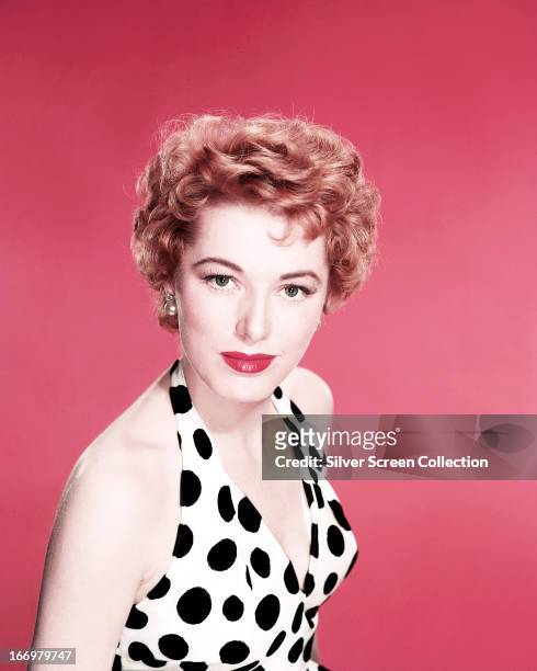 American actress Eleanor Parker wearing a black and white polka dot top, circa 1950.