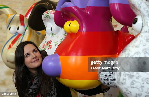 Fundraising manager Lauren Vincent poses with Gromit sculptures, out of around 70 which have been painted by celebrity artists before they are placed...