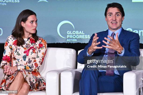 Former prime minister of Finland Sanna Marin and Canadian prime minister Justin Trudeau speak at the Global Progress Action Summit on September 16,...