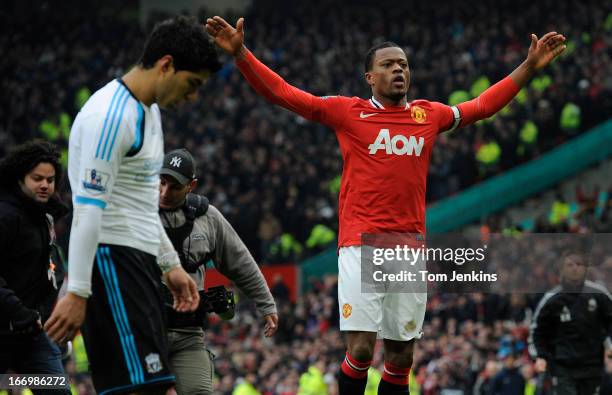 Patrice Evra of Manchester United celebrates in front of Luis Suarez of Liverpool after the Manchester United versus Liverpool FA Premier League...