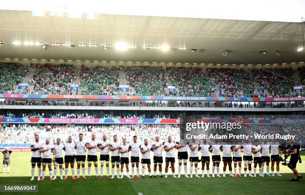 The players of Romania sing a rendition of the Romanian national anthem prior to the Rugby World Cup France 2023 match between Ireland and Romania at...