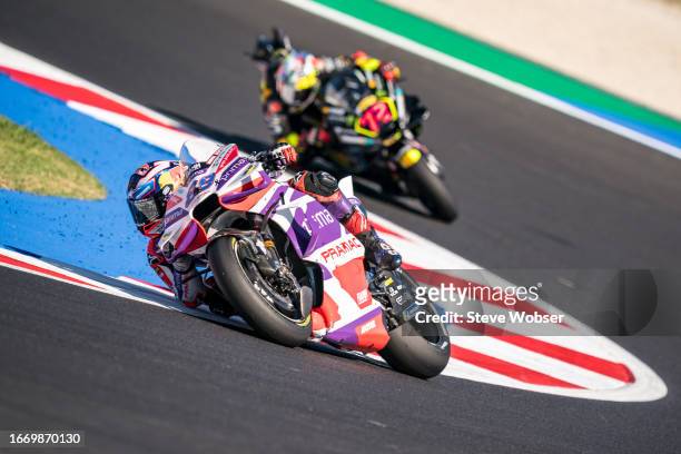 Jorge Martin of Spain and Prima Pramac Racing leads in front of Marco Bezzecchi of Italy and Mooney VR46 Racing Team during the Sprint of the MotoGP...