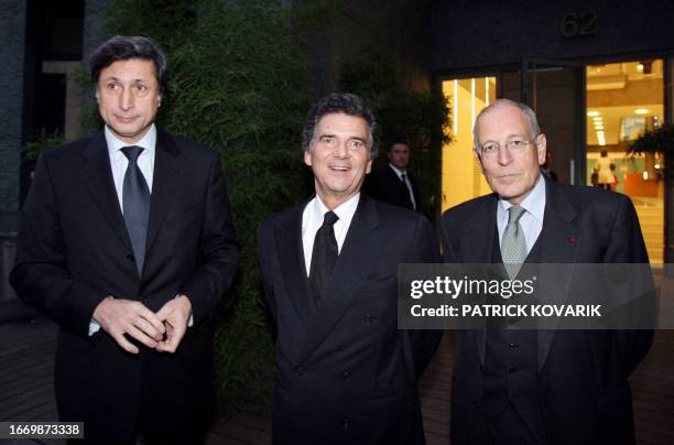 The president of the new French-international news TV channel France 24, Alain de Pouzilhac poses next to the president of France Television Patrick...