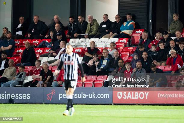 Paul Scholes, Co-owner of Salford City and former Manchester United player Roy Keane watch on during the Sky Bet League Two match between Salford...