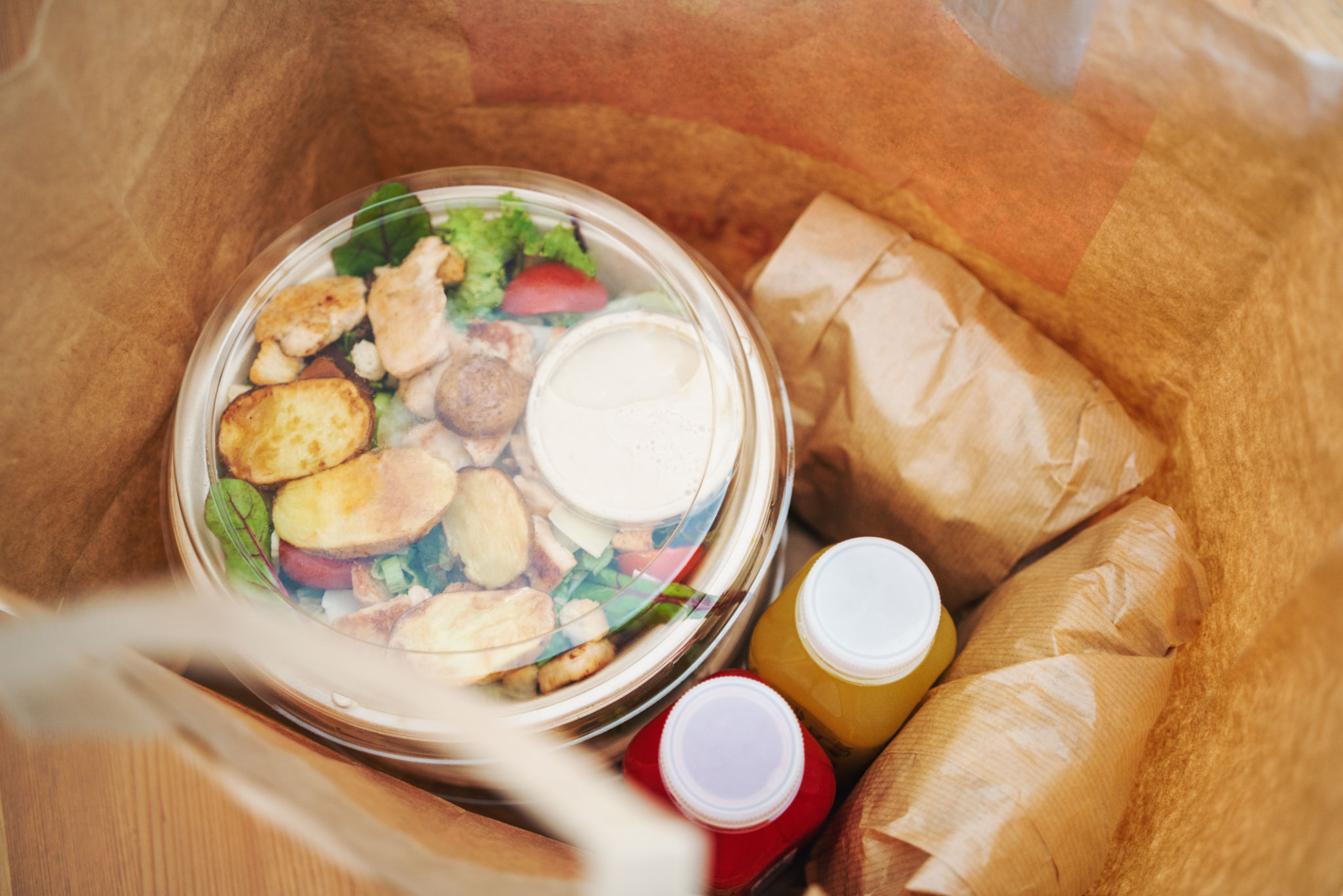 Paper bag with takeaway food ready for delivery Paper bag with takeaway food ready for delivery