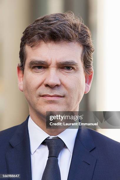 French Minister for Industrial Renewal and Food Industry Arnaud Montebourg looks on as he addresses reporters following his meeting with French...