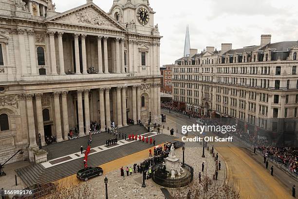 Members of the Armed Services carry the coffin away from St Paul's Cathedral after the Ceremonial funeral of former British Prime Minister Baroness...