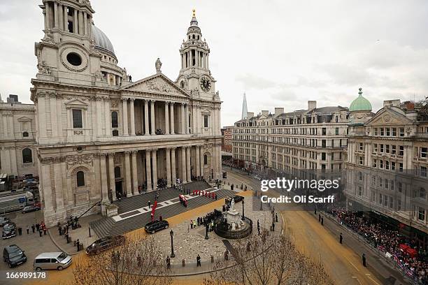 Members of the Armed Services carry the coffin away from St Paul's Cathedral after the Ceremonial funeral of former British Prime Minister Baroness...