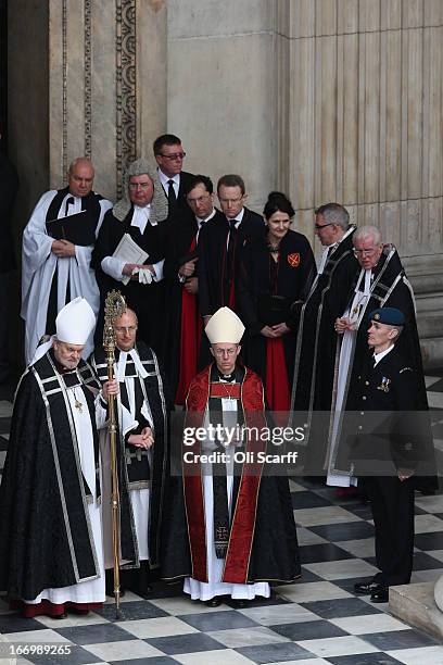 Justin Welby , the Archbishop of Canterbury, and Richard Chartres , the Bishop of London, leave the Ceremonial funeral of former British Prime...