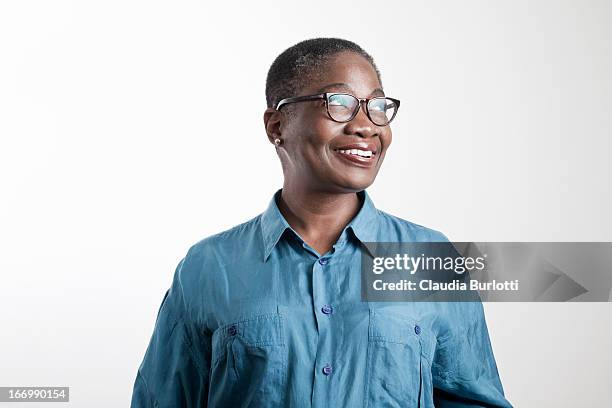 happy african lady with glasses - woman looking away stock pictures, royalty-free photos & images