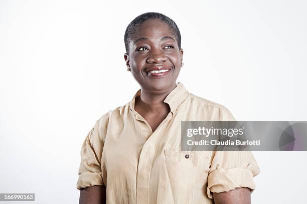 happy african lady smiling - white backgrounds stock pictures, royalty-free photos & images