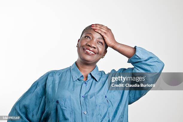happy african lady - confused white background stock-fotos und bilder