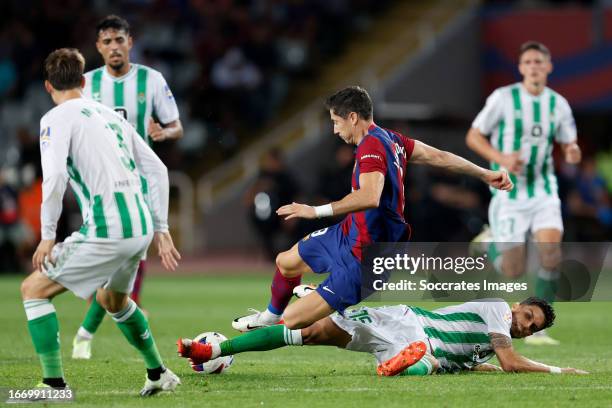 Robert Lewandowski of FC Barcelona, Marc Bartra of Real Betis during the LaLiga EA Sports match between FC Barcelona v Real Betis Sevilla at the...