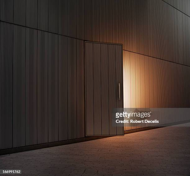 slightly open door lit from within - possibilities stock pictures, royalty-free photos & images