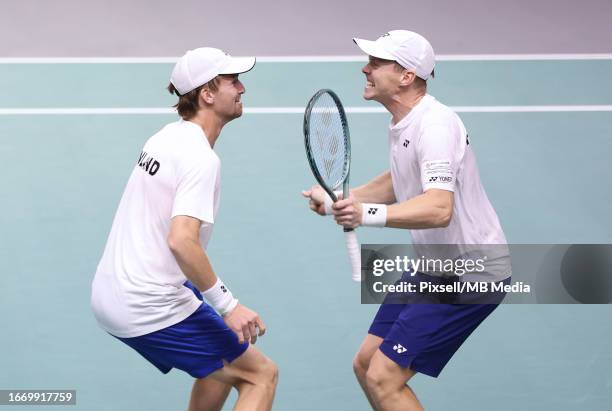 Harri Heliovaara and Patrik Kaukovalta of Finland celebrate after defeating Austin Krajicek and Rajeev Ram of USA during the 2023 Davis Cup Finals...