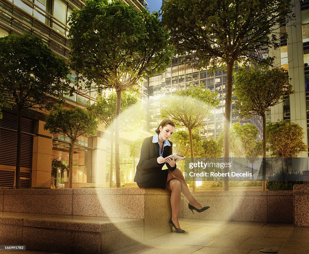 Businesswoman within virtual sphere