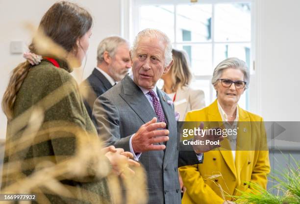 King Charles III meets students carrying out root and soil structure analysis during a visit to officially open the MacRobert Farming and Rural...