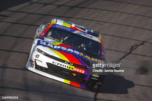 Ryan Ellis, driver of the Kansas Land/American Racing Chevrolet, drives during qualifying for the NASCAR Xfinity Series Kansas Lottery 300 at Kansas...