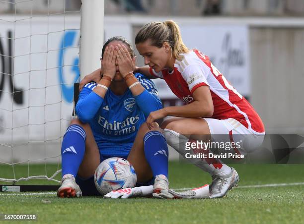 Manuela Zinsberger of Arsenal is consoled by Cloe Lacasse after defeat in the penalty shoot out after the Women's UEFA Champions League Group 3 Round...